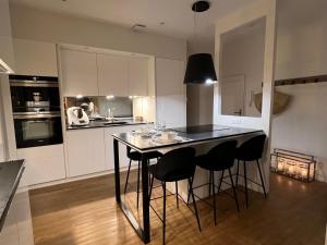 Appartements Luxe et Charme - Le Carre Saint-Silain - Meuble de tourisme 3 etoiles : photos des chambres