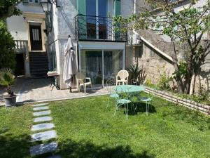 Appartements Charmant studio avec jardin : photos des chambres