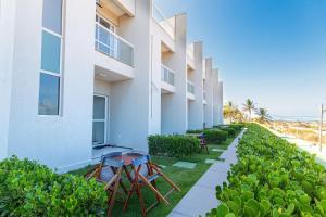 Beach Townhouses #C6 - Triplex por Carpediem