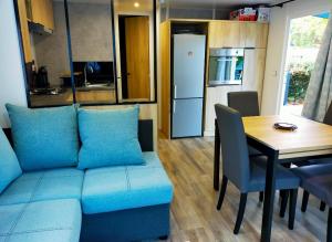 Campings Mobil home dans un camping **** la reserve / siblu : photos des chambres