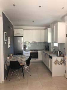 Renovated apartment with garden and parking space