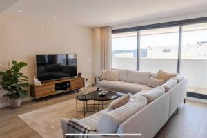 Spacious 3 Bedroom with 2 Terraces, pool, and walking distance to the beach