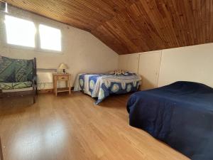 Maisons de vacances Maison Le Grand-Village-Plage, 5 pieces, 10 personnes - FR-1-246A-153 : photos des chambres