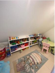 Maisons de vacances Maison au calme avec piscine pres de Truchtersheim, a 15 minutes de Strasbourg : photos des chambres