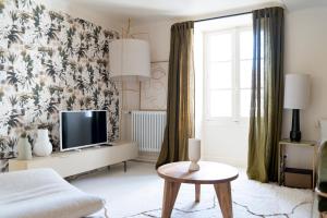 Appartements Sejours Maison Baluchon : photos des chambres