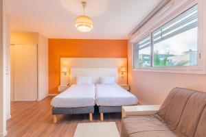 Appart'hotels Appart’City Confort Montpellier Ovalie I : Studio Familial Supérieur avec Lits Jumeaux