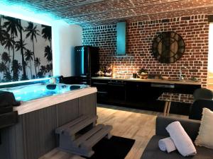 Appartements •La Suite• Appart Spa by Spaona• La Buena Vida• : photos des chambres