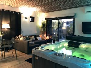 Appartements •Le Cosy• Appart Spa & Sauna by Spaona • : photos des chambres