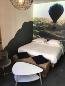 Appartements La tete dans les nuages : photos des chambres