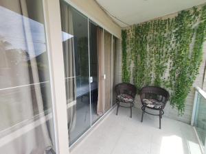 Apartamento com suite em Garatucaia.