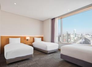 Phòng Loại Sang Tầng Cao Ba Người (High Floor Deluxe Triple Room)