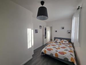 Appartements F2 cosy proche Disney et Paris : photos des chambres