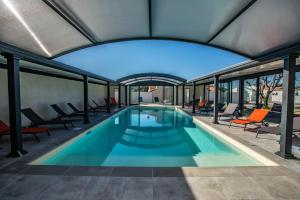 Maisons de vacances LE VAISSEAU Maison avec piscine/parking/wifi/plages 5kms : photos des chambres