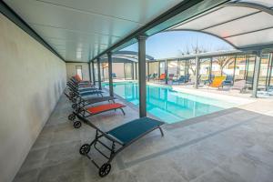 Maisons de vacances LE VAISSEAU Maison avec piscine/parking/wifi/plages 5kms : photos des chambres