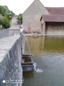 Maisons d'hotes Les Chambres du Lavoir : photos des chambres