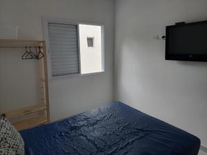 Ubatuba - Apartamento com Churrasqueira e Piscina