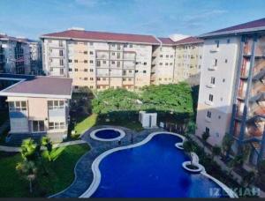 Amaia Steps Nuvali fully furnished unit with swimming pool view near Carmelray Pitland