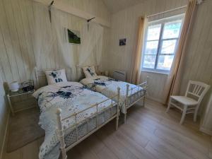 Maisons de vacances Gite Taintrux, 3 pieces, 4 personnes - FR-1-589-457 : photos des chambres