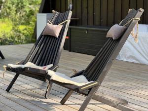 Koselig hytte med uteplas ved Hallingdalselva