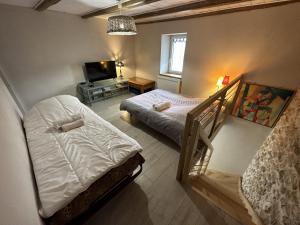 Sejours a la ferme La Ferme aux Diligences : Appartement 1 Chambre