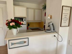 Appartement avec grande terrasse dans un magnifique parc à 5 minutes de la plage