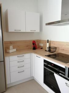 Prachtig gelijkvloers appartement met verwarmd zwembad & fitness