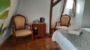 Maisons d'hotes L'Ostal de Gagnac : photos des chambres