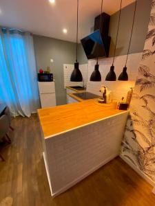 Appartements T2 cosy / quartier calme / magasins d’usine a proximite : photos des chambres