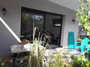 Appartements Maisonnette 28 M2 au fond du jardin calme&confort : photos des chambres