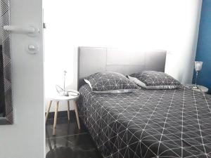 Appartements Maisonnette 28 M2 au fond du jardin calme&confort : photos des chambres