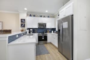 Waterfront luxury Villa 54 with sunset views and boat slip townhouse