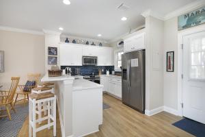 Waterfront luxury Villa 54 with sunset views and boat slip townhouse