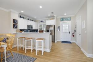 Waterfront luxury Villa 54 with sunset views and boat slip townhouse