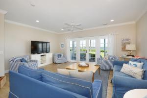 Waterfront luxury Villa 54 with sunset views and boat slip townhouse