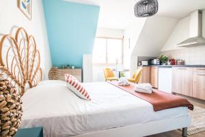 Appartements L'Oasis : photos des chambres