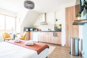 Appartements L'Oasis : photos des chambres