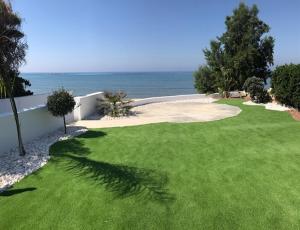 Beach Front Periyiali Gardens