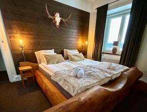 Quadruple Room with Lake View room in Kungshaga Hotell