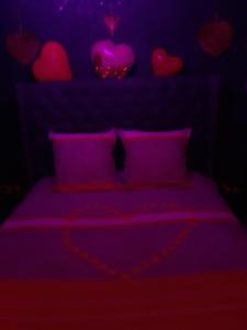 Appartements LOVE ROOM Le rouge et noir : photos des chambres