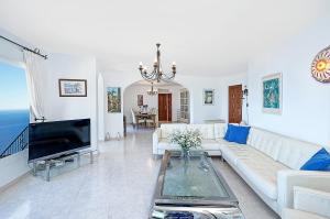 Breathtaking Seaside Villa with Heated Saltwater Pool & Panoramic Terraces