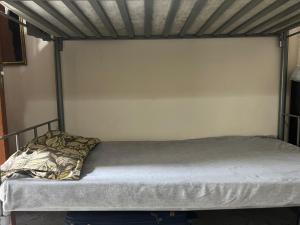 Dormitory bed space in a shared room