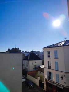 Appartements La vie en blanc et noir Maisons-Laffitte : photos des chambres