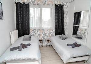 Appartements Le nid douillet : photos des chambres