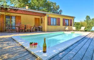 Awesome home in St Andr-Roquepertuis with 3 Bedrooms, WiFi and Outdoor swimming pool