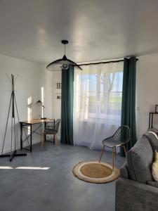 Maisons de vacances Le 14 : photos des chambres