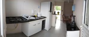 Apto terreo com piscina, quintal e churrasqueira