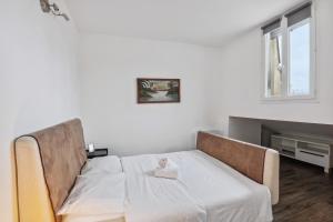 Appartements Au coeur du triangle d'or de Versailles : photos des chambres