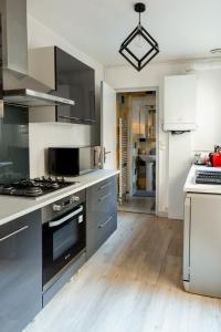 Appartements Le Theodore Bac-Spacieux T2 - Coup de coeur en face de la gare des Benedictins : photos des chambres