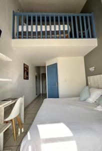 Hotels Hotel Les Palmiers En Camargue : photos des chambres