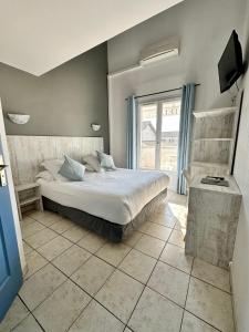 Hotels Hotel Les Palmiers En Camargue : photos des chambres